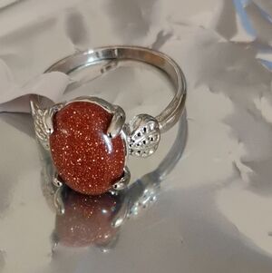 Goldstone Venturina" or "Golden Sunstone Gemstone With A Stunning Silver Band